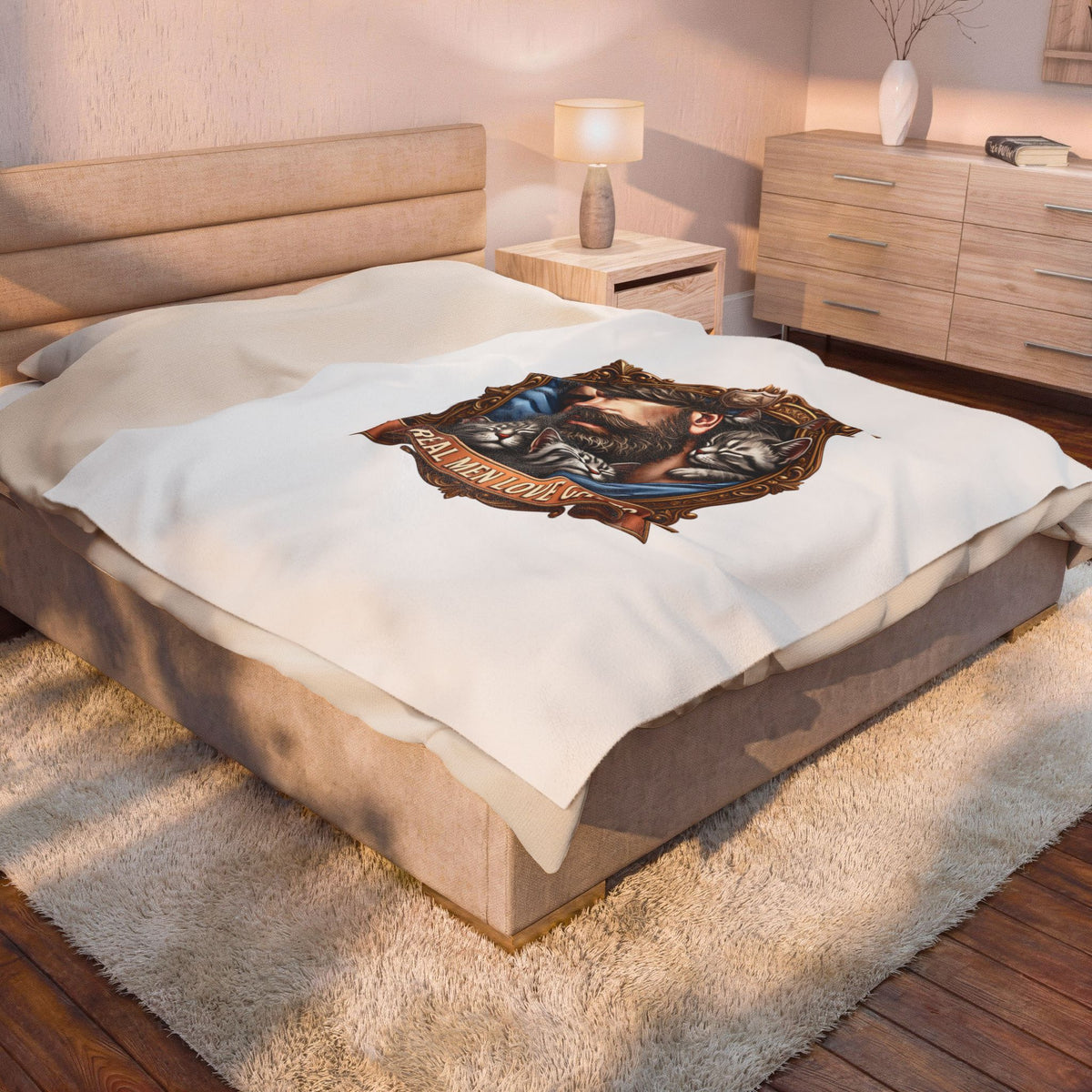 Real Men Love Cats velveteen plush throw, 60 by 80 inches, spread across the foot of a bed.