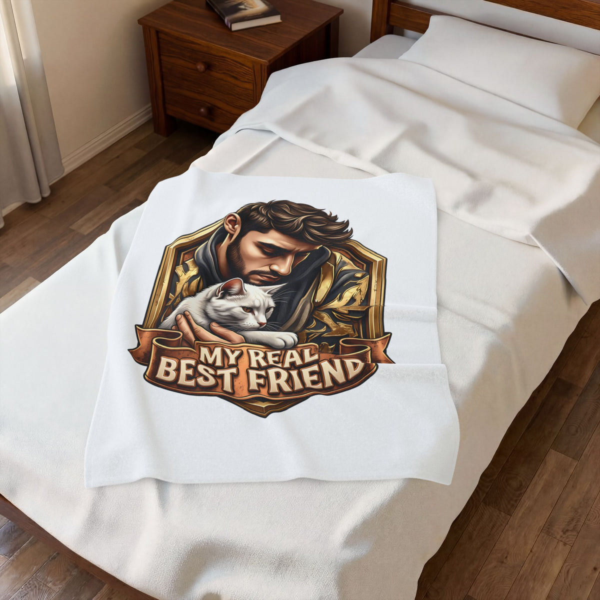 My Real Best Friend velveteen plush throw, 30 by 40 inches, folded on the corner of a bed.