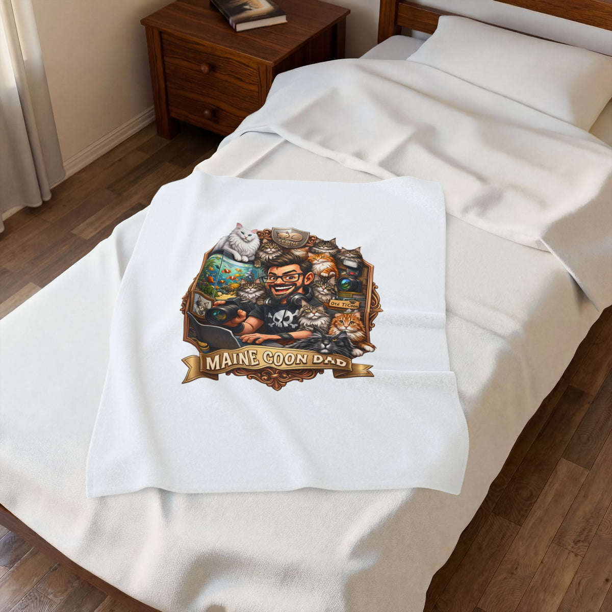Maine Coon Dad velveteen plush throw, 30 by 40 inches, folded on the corner of a bed.